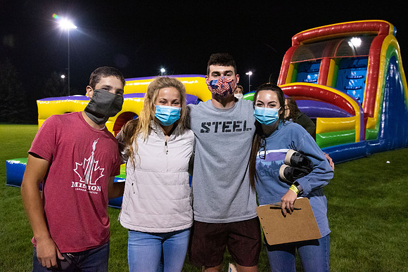 Students enjoy activities while wearing face masks to kick off the fall semester.