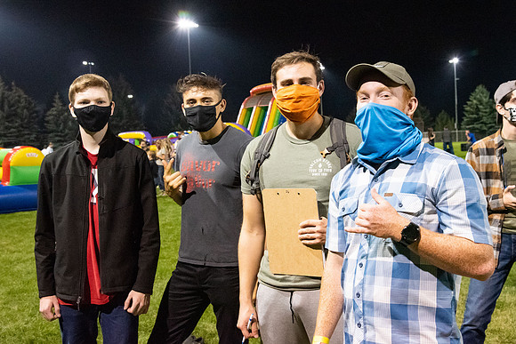 Students enjoy activities while wearing face masks to kick off the fall semester.
