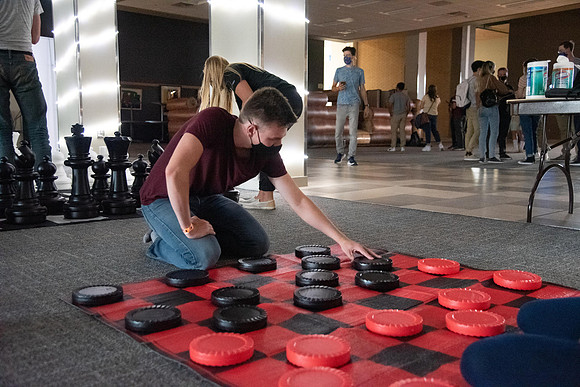 Students enjoy activities while wearing face masks to kick off the fall semester.