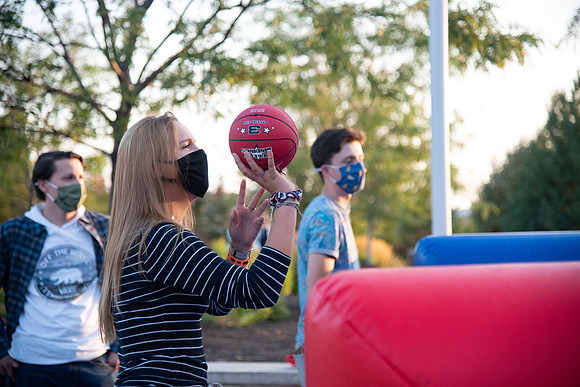 Students enjoy activities while wearing face masks to kick off the fall semester.