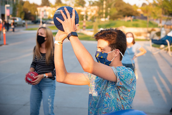 Students enjoy activities while wearing face masks to kick off the fall semester.