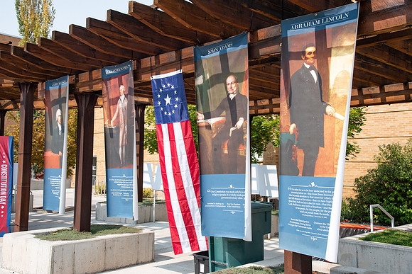 Posters in the amphitheater about who signed the constitution.