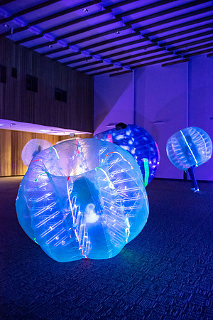 Students playing with the bubble balls during student activities night.
