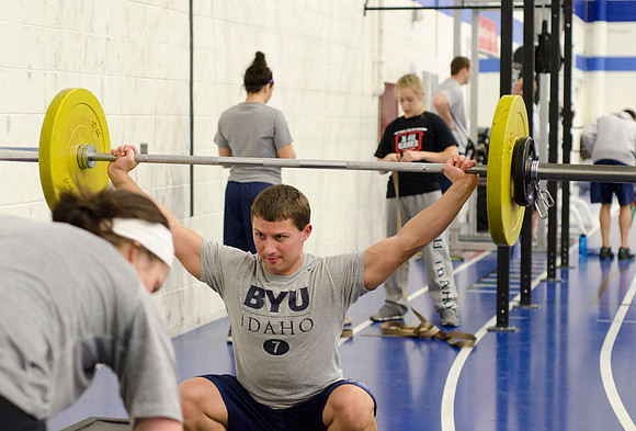 Students workout in the fitness center in the Hart building.