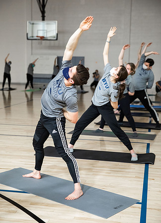 BYUI students doing high fitness, yoga, and kickboxing classes.