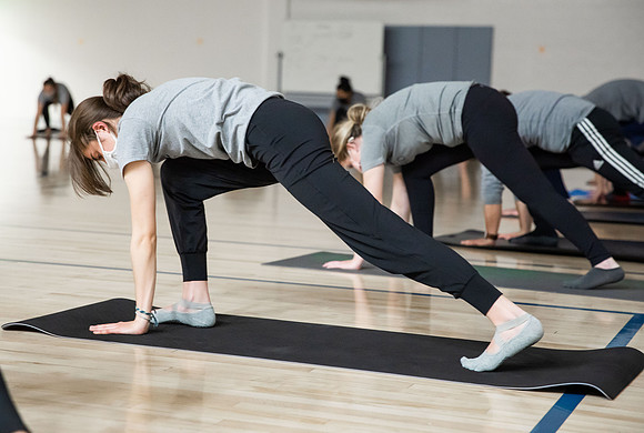BYUI students doing high fitness, yoga, and kickboxing classes.
