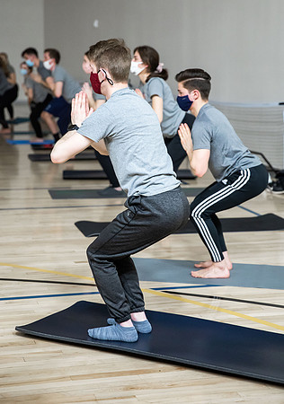 BYUI students doing high fitness, yoga, and kickboxing classes.