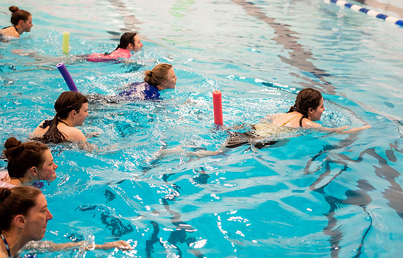 BYUI students doing water aerobics class.