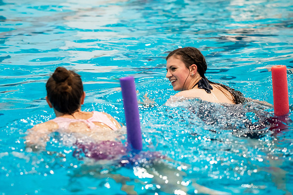 BYUI students doing water aerobics class.