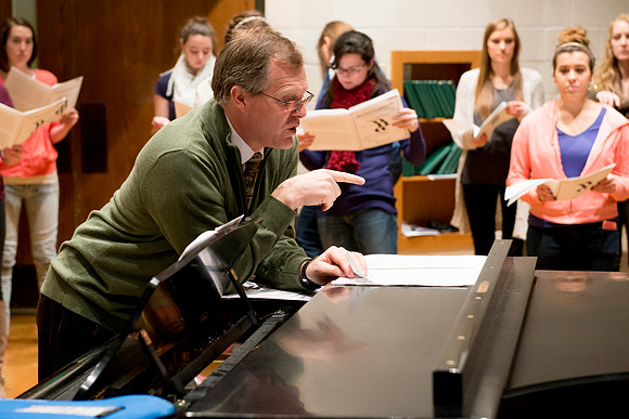 Brother Randall Kempton teaches and conducts his Collegiate Singers Choir.