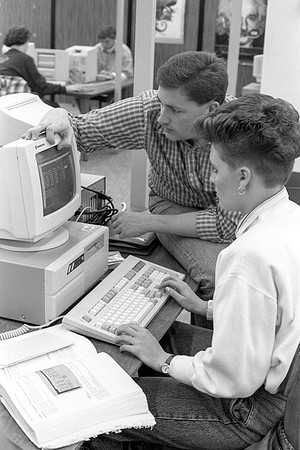 Students work in the Computer Lab on campus. November 1990.