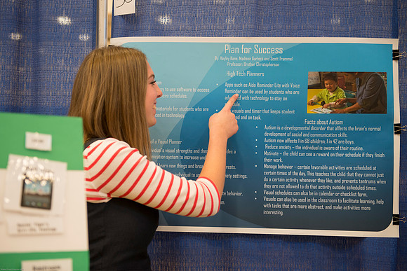Students present their projects for the Student Research and Creative Works Conference.
