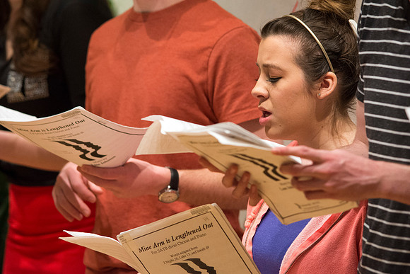Randall Kempton instructs the talented students who make up the Collegiate Singers at BYU-Idaho.