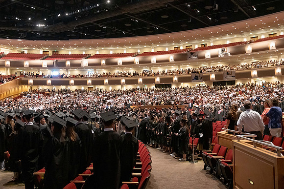 All BYU-Idaho graduates gathered in the BYU-Idaho Center for a commencement ceremony with David A. Bednar speaking.