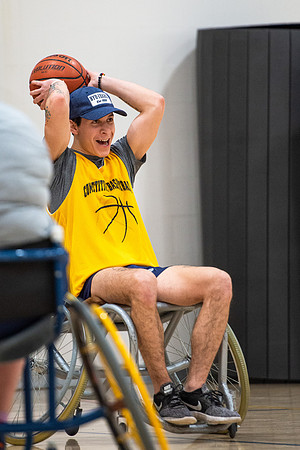 Students participate of Wheelchair Basketball in the Hart Gym.