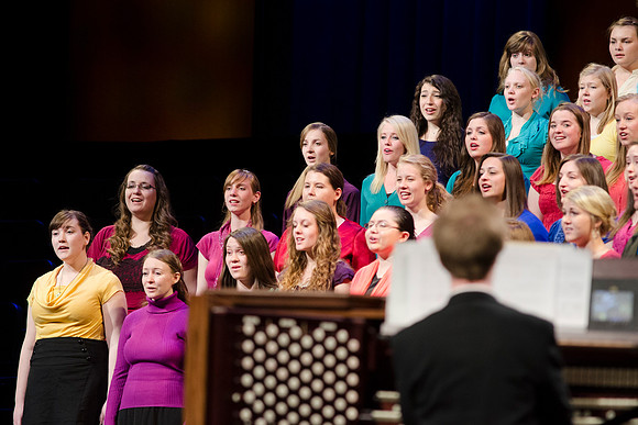 The BYU-I University Choir sings during the 2014 Winter Semester Graduation Commencement. Photo by Tyler Rickenbach