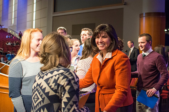 Carole Stephens meets with Brigham Young university-Idaho students and shakes hands with them. Photo by Ryan Chase