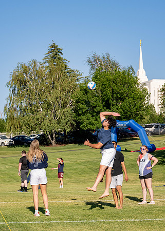 Students gather at the upper field for various 4th of July activities.