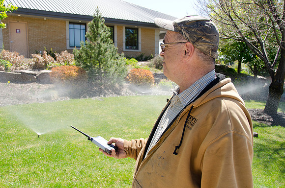 Dave test the automated sprinkler control.