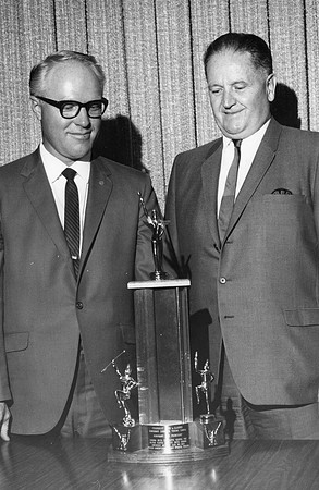 Viking Band trophy reads: " President John L. Clarke, Honorary Director Viking Bands, Honorary … President, Gamma Beta …appa Kappa PSI Alpha Kappa …au Beta Sigma, Awarded Monday Aug. 28, 1967, Texas C