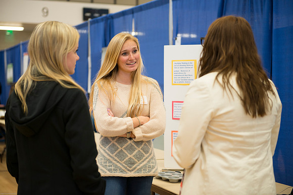 Students present their projects for the Student Research and Creative Works Conference.