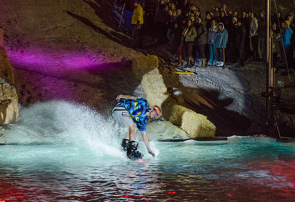 Students at Brigham Young University-Idaho take part in the annual Pond Skimming event held on campus at BYU-Idaho. Students wait in the cold or take the daring attempt to skim a pool of water using a