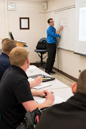 Students in a Civil Engineering class, Reinforced Concrete Design, are taught by Nathan Harris.