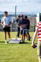 Students gather at the upper field for various 4th of July activities.