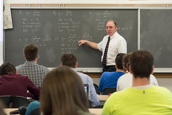 Brother Johanson talks with his Math 109 Precalculus during the 2014 Spring Semester.