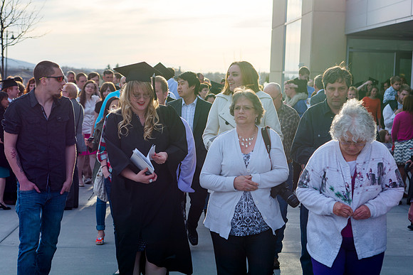 Brigham Young University-Idaho Graduates tour campus with their families saying goobyes to peers and getting pictures with friends and family before the convocation ceremonies. Photo by Ryan Chase