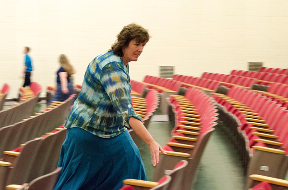 Participants count the seats in the Kirkham Auditorium.