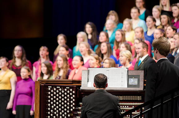 Edward Poston plays God So Loved the World during the 2014 Winter Graduation Commencement in the I-Center. Photo by Tyler Rickenbach