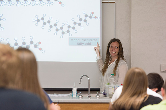 Sister Amanda Christensen smiles at a comment made by a student during class in the 2014 Spring Semester.
