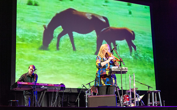 Jim Curry performs songs of John Denver at the Hart Auditorium.