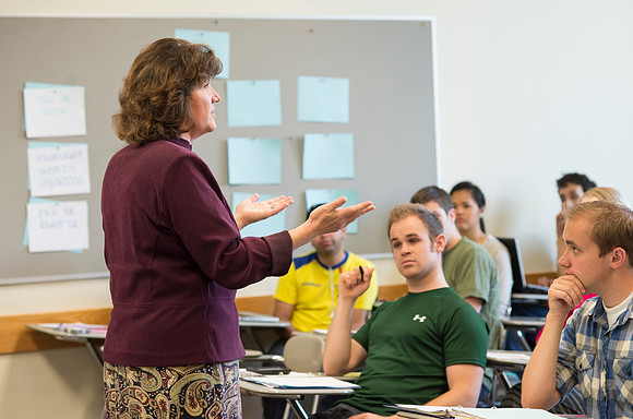 Sister Brooke McKenna teaches students in a communication class.