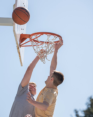 BYU-Idaho Admissions Viewbook. Jacob Kaiser playing basketball. Spring Semester