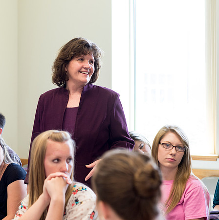 Sister Brooke McKenna teaches students in a communication class.