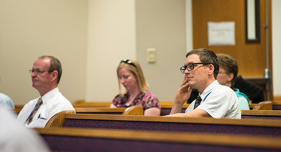 Faculty gather in the Hinckley Building for a conference to learn from their peers.