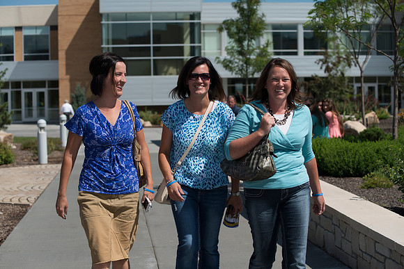 Friends walk together between classes.