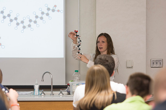 Sister Amanda Christensen demonstrates to her Essentials of Human Nutrition class what makes up a fatty acid, during the 2014 Spring Semester.