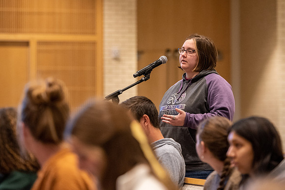 Stacy Taniguchi speaks to students about Choosing to Strive at the Taylor Chapel.