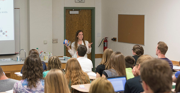 Sister Amanda Christensen talks to her Essentials of Human Nutrition class about the different kinds of oils used in cooking.