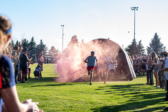 Students gather at the upper field for various 4th of July activities.
