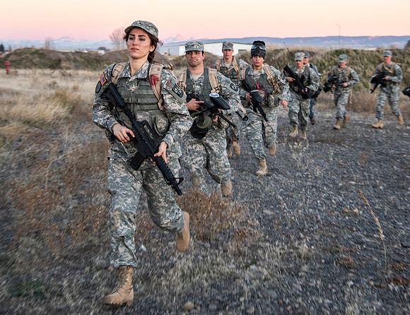 Members of BYU-Idaho's ROTC program perform practice missions in abandoned housing development buildings.