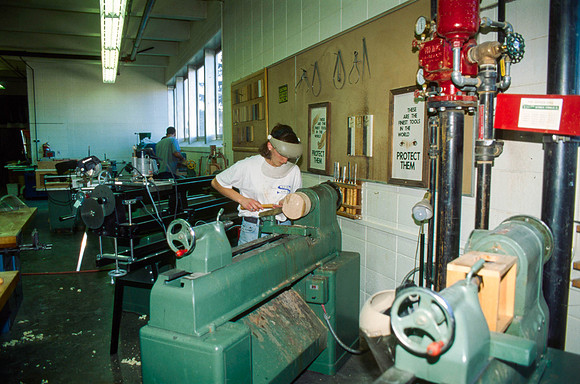 Student works diligently on a piece for Woodworking. Sep 1997.