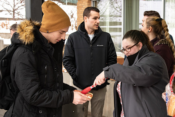 Power to Become council gives away free hotdogs to students to help get them excited to go to the P2B event.
