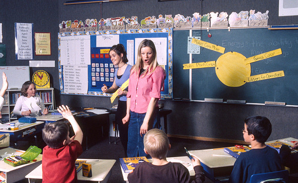 Student teachers practice in the classroom. March 6, 2002.
