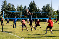 Students gather at the upper field for various 4th of July activities.