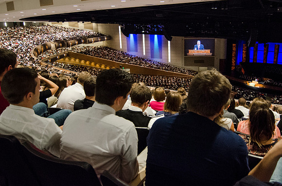 Students gather in the BYU-Idaho Center for devotional to listen to Elder Holland.
