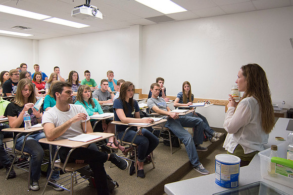 Sister Amanda Christensen explains the uses of coconut oil to her Essential of Human Nutrition class during the 2014 Spring Semester.